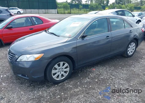 2009 Toyota Camry Xle z USA, uszkodzony, nr VIN 4T4BE46K49R129330